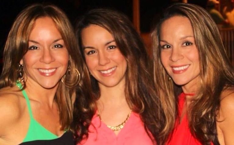 Cynthia (left) and Audrey (right) with their younger sister Stephanie in the middle.